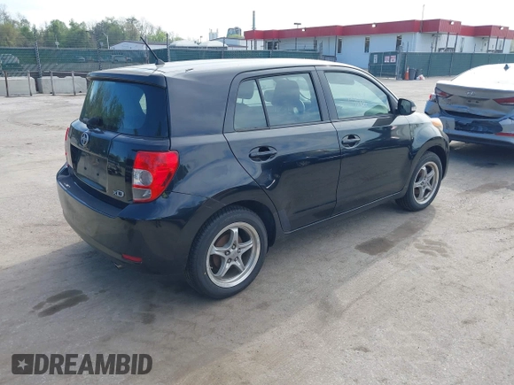 2009 Scion xD with VIN JTKKU10409J041654, listed as a IAAI auction lot 42036558 with 122,661 mi miles. Bid and sale history available at carsss.com. Image 4.