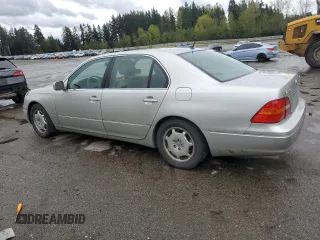 2002 Lexus LS 430 with VIN JTHBN30F120075551, listed as a Copart auction lot 52411405 with 194,704 mi miles and Salvage Title. Bid and sale history available at DreamBid. Image 2.