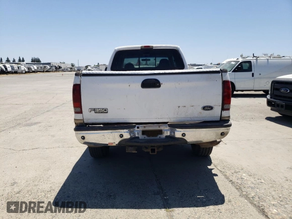 2002 Ford F-350 XL with VIN 1FTSW31F52EC95663, listed as a Copart auction lot 61106125 with Not provided miles and Salvage title. Bid and sale history available at DreamBid. Image 6.