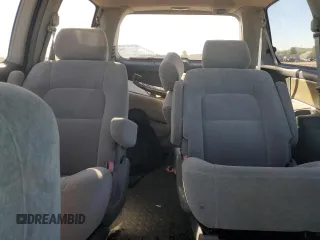 1999 Honda Odyssey EX with VIN 2HKRL1860XH541737, listed as a Copart auction lot 88897965 with 112,164 mi miles and Salvage title. Bid and sale history available at DreamBid. Image 10.