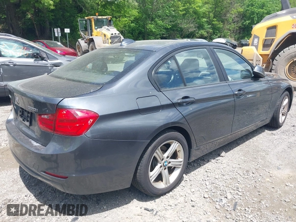 2014 BMW 3 Series 320i xDrive with VIN WBA3C3C57EP662795, listed as a IAAI auction lot 42267683 with 153,451 mi miles and . Bid and sale history available at DreamBid. Image 4.