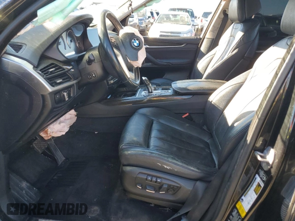 2014 BMW X5 xDrive35i z VIN 5UXKR0C59E0K51868, wystawiony jako Copart lot #79139994 z przebiegiem Nie podano mil oraz Szkoda całkowita • Salvage title. Historia ofert i sprzedaży dostępna na DreamBid. Obrazek 7.