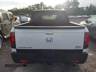 2023 Honda Ridgeline Sport z VIN 5FPYK3F14PB049364, wystawiony jako IAAI lot #40474507 z przebiegiem Nie podano mil oraz . Historia ofert i sprzedaży dostępna na DreamBid. Obrazek 16.