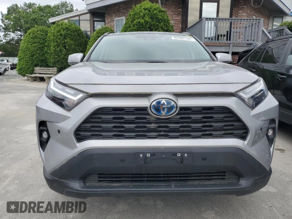 2022 Toyota RAV4 Hybrid XLE Premium with VIN 2T3B6RFV5NW034498, listed as a Copart auction lot 62395105 with 10,590 mi miles and Clean title. Bid and sale history available at DreamBid. Image 5.