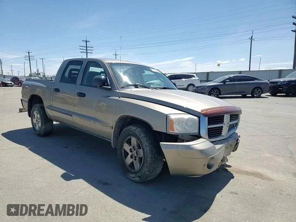 2006 Dodge Dakota SLT z VIN 1D7HW48NX6S709353, wystawiony jako Copart lot #58043225 z przebiegiem 222 008 mil mil oraz Szkoda całkowita • Salvage title. Historia ofert i sprzedaży dostępna na DreamBid. Obrazek 13.