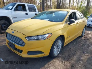 2015 Ford Fusion SE Hybrid with VIN 3FA6P0LU5FR255505, listed as a IAAI auction lot 42104362 with 399,115 mi miles. Bid and sale history available at carsss.com. Image 6.