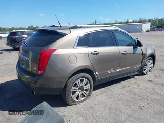 2014 Cadillac SRX Luxury Collection z VIN 3GYFNEE3XES587233, wystawiony jako IAAI lot #41747779 z przebiegiem 116 571 mil mil oraz . Historia ofert i sprzedaży dostępna na DreamBid. Obrazek 4.