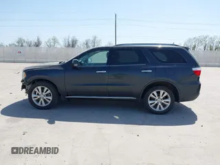 2013 Dodge Durango Crew with VIN 1C4SDHDT5DC637535, listed as a IAAI auction lot 41867982 with 162,569 mi miles and . Bid and sale history available at DreamBid. Image 14.