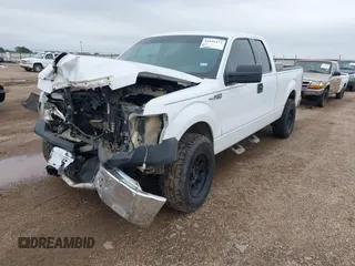 2014 Ford F-150 XL with VIN 1FTFX1CFXEKF94927, listed as a IAAI auction lot 42441473 with 127,857 mi miles and . Bid and sale history available at DreamBid. Image 2.