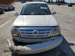 2005 Suzuki XL7 LX z VIN JS3TX92VX54100730, wystawiony jako Copart lot #74913534 z przebiegiem 91 838 mil mil oraz Szkoda całkowita • Salvage title. Historia ofert i sprzedaży dostępna na DreamBid. Obrazek 5.