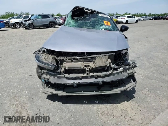 2022 Honda Civic Sport z VIN 2HGFE2F54NH515517, wystawiony jako Copart lot #54695585 z przebiegiem Nie podano mil oraz Szkoda całkowita • Salvage title. Historia ofert i sprzedaży dostępna na DreamBid. Obrazek 14.