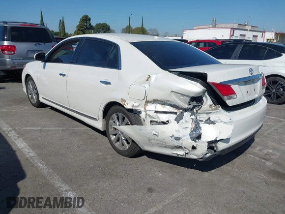 2012 Toyota Avalon with VIN 4T1BK3DB1CU469574, listed as a IAAI auction lot 41633881 with 128,425 mi miles and . Bid and sale history available at DreamBid. Image 3.