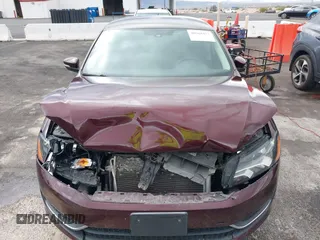 2014 Volkswagen Passat S z VIN 1VWAP7A37EC018810, wystawiony jako IAAI lot #40968457 z przebiegiem 102 606 mil mil oraz . Historia ofert i sprzedaży dostępna na DreamBid. Obrazek 6.