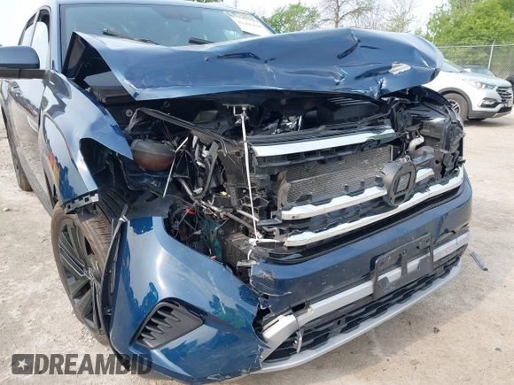 2022 Volkswagen Atlas SE z VIN 1V2KC2CA9NC216742, wystawiony jako IAAI lot #42406428 z przebiegiem 34 598 mil mil oraz . Historia ofert i sprzedaży dostępna na DreamBid. Obrazek 6.