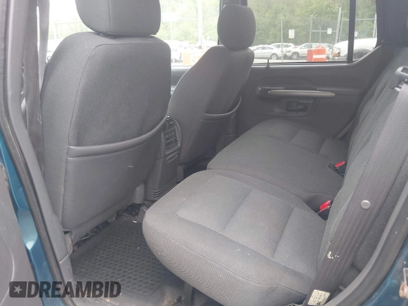 2001 Ford Explorer Sport Trac z VIN 1FMZU77E11UC71161, wystawiony jako IAAI lot #42184342 z przebiegiem 196 240 mil mil oraz . Historia ofert i sprzedaży dostępna na DreamBid. Obrazek 8.