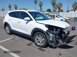 2021 Hyundai Tucson Value z VIN KM8J33A41MU293190, wystawiony jako IAAI lot #42301932 z przebiegiem 98 382 mil mil oraz . Historia ofert i sprzedaży dostępna na DreamBid. Obrazek 1.