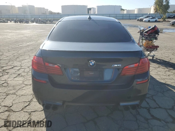 2014 BMW M5 z VIN WBSFV9C55ED593760, wystawiony jako Copart lot #49070765 z przebiegiem 128 365 mil mil oraz Tytuł czysty. Historia ofert i sprzedaży dostępna na DreamBid. Obrazek 6.