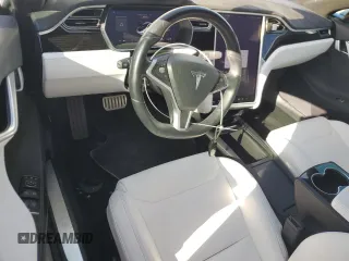 2016 Tesla Model S 90D with VIN 5YJSA1E49GF159988, listed as a Copart auction lot 76457024 with Not Provided miles and Salvage Title. Bid and sale history available at DreamBid. Image 8.
