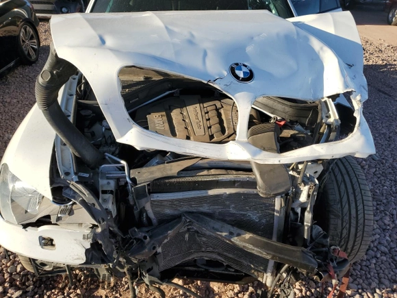 2013 BMW X5 xDrive50i with VIN 5UXZV8C55D0C16304, listed as a Copart auction lot 53406135 with 103,704 mi miles and Salvage title. Bid and sale history available at DreamBid. Image 12.