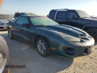 2000 Pontiac Firebird Formula z VIN 2G2FV22G2Y2160915, wystawiony jako Copart lot #76196454 z przebiegiem Nie podano mil oraz Czysty tytuł • Clean title. Historia ofert i sprzedaży dostępna na DreamBid. Obrazek 4.