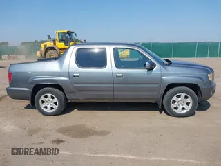 2009 Honda Ridgeline RTS z VIN 5FPYK16479B107114, wystawiony jako IAAI lot #42452199 z przebiegiem 206 853 mil mil oraz . Historia ofert i sprzedaży dostępna na DreamBid. Obrazek 13.