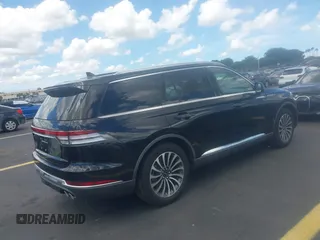 2021 Lincoln Aviator Reserve with VIN 5LM5J7WC0MGL12385, listed as a IAAI auction lot 42472422 with 20,404 mi miles and . Bid and sale history available at DreamBid. Image 4.