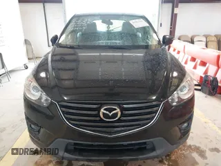2016 Mazda CX-5 Touring with VIN JM3KE2CY7G0867355, listed as a IAAI auction lot 41963169 with 117,727 mi miles and . Bid and sale history available at DreamBid. Image 12.