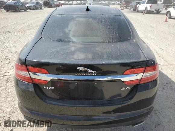 2014 Jaguar XF SC with VIN SAJWA0EX2E8U21886, listed as a Copart auction lot 76783344 with 97,280 mi miles and Salvage Title. Bid and sale history available at DreamBid. Image 6.