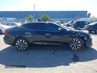2016 Nissan Maxima SL with VIN 1N4AA6AP9GC448087, listed as a IAAI auction lot 41828781 with 99,436 mi miles and . Bid and sale history available at DreamBid. Image 13.