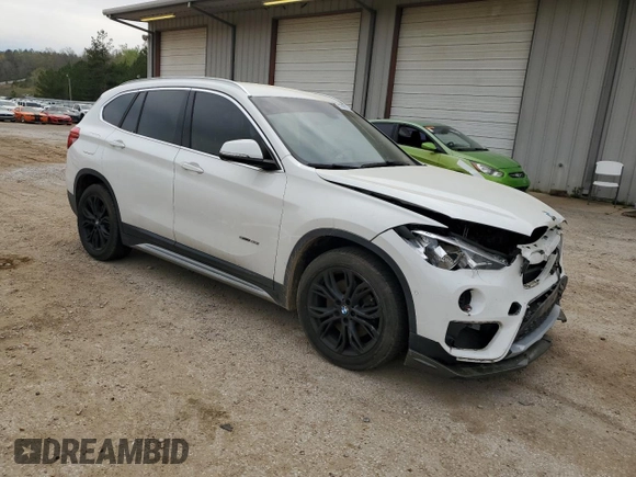 2017 BMW X1 sDrive28i with VIN WBXHU7C30H5H38049, listed as a Copart auction lot 51007915 with 52,963 mi miles and Salvage Title. Bid and sale history available at carsss.com. Image 4.