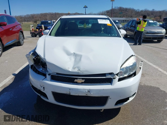 2014 Chevrolet Impala LTZ with VIN 2G1WC5E36E1182793, listed as a IAAI auction lot 41817899 with 171,776 mi miles and . Bid and sale history available at DreamBid. Image 12.