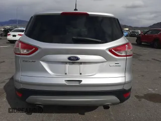 2014 Ford Escape SE with VIN 1FMCU0GX3EUB01095, listed as a Copart auction lot 51464455 with 106,731 mi miles and Salvage Title. Bid and sale history available at carsss.com. Image 6.