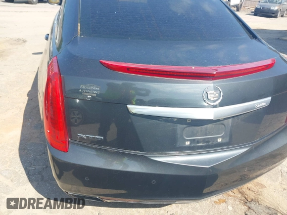 2013 Cadillac XTS Luxury z VIN 2G61P5S37D9110658, wystawiony jako IAAI lot #42196442 z przebiegiem 182 228 mil mil oraz . Historia ofert i sprzedaży dostępna na DreamBid. Obrazek 17.