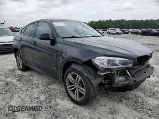 2017 BMW X6 xDrive35i with VIN 5UXKU2C32H0X48127, listed as a Copart auction lot 52473473 with 128,791 mi miles. Bid and sale history available at carsss.com. Image 4.