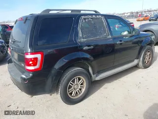 2010 Ford Escape XLT with VIN 1FMCU0DG5AKD45566, listed as a IAAI auction lot 41232118 with 166,816 mi miles. Bid and sale history available at carsss.com. Image 4.
