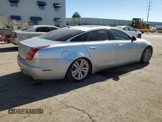 2014 Jaguar XJ Portfolio with VIN SAJWA2GZ2E8V70065, listed as a Copart auction lot 43872505 with 138,677 mi miles and Salvage title. Bid and sale history available at DreamBid. Image 3.