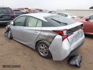 2022 Toyota Prius L Eco with VIN JTDKAMFU9N3185999, listed as a IAAI auction lot 41428106 with 50,798 mi miles. Bid and sale history available at carsss.com. Image 3.