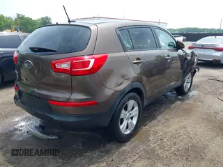 2012 Kia Sportage LX z VIN KNDPB3A20C7290990, wystawiony jako IAAI lot #42264420 z przebiegiem 87 994 mil mil oraz . Historia ofert i sprzedaży dostępna na DreamBid. Obrazek 4.