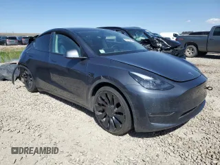 2022 Tesla Model Y Performance with VIN 7SAYGDEF1NF466938, listed as a Copart auction lot 53678045 with 50,135 mi miles and Salvage Title. Bid and sale history available at DreamBid. Image 4.
