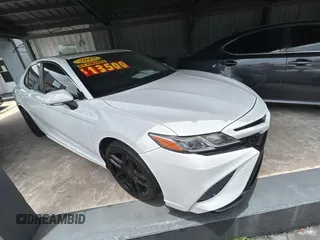 2018 Toyota Camry LE с VIN JTNB11HK1J3023123, выставлен на аукционе Copart как лот 60148455 с пробегом 183 332 миль миль и Чистый • Clean title. История ставок и продаж доступна на DreamBid. Изображение 1.