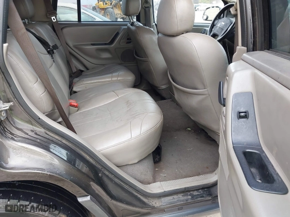 2004 Jeep Grand Cherokee Laredo with VIN 1J4GX48N74C412982, listed as a IAAI auction lot 41496258 with 195,671 mi miles. Bid and sale history available at carsss.com. Image 8.