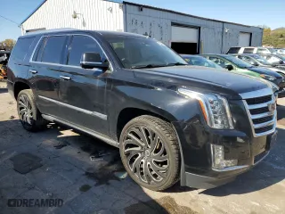 2015 Cadillac Escalade Premium with VIN 1GYS4NKJ4FR550932, listed as a Copart auction lot 75877054 with 164,603 mi miles and Salvage Title. Bid and sale history available at carsss.com. Image 4.