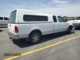2003 Ford F-150 XL with VIN 2FTRX17L23CA17128, listed as a Copart auction lot 60144965 with 121,055 mi miles and Salvage title. Bid and sale history available at DreamBid. Image 3.