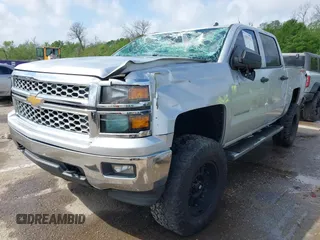 2014 Chevrolet Silverado 1500 LT with VIN 3GCUKREC3EG456385, listed as a IAAI auction lot 41931312 with 62,616 mi miles and . Bid and sale history available at DreamBid. Image 2.
