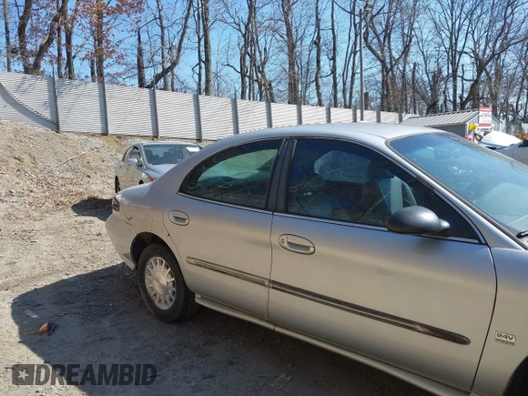1999 Mercury Sable LS z VIN 1MEFM53S7XA622932, wystawiony jako IAAI lot #41708531 z przebiegiem 155 702 mil mil oraz . Historia ofert i sprzedaży dostępna na DreamBid. Obrazek 17.