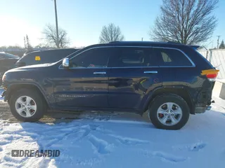 2014 Jeep Grand Cherokee Overland with VIN 1C4RJFCG1EC200570, listed as a IAAI auction lot 41301398 with 183,986 mi miles. Bid and sale history available at carsss.com. Image 15.