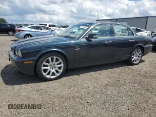 2008 Jaguar XJ 8 with VIN SAJWA71B68SH23145, listed as a Copart auction lot 63817035 with 57,391 mi miles and Salvage title. Bid and sale history available at DreamBid. Image 1.