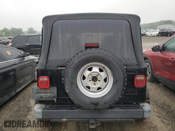 1999 Jeep Wrangler SE with VIN 1J4FY29P3XP408468, listed as a Copart auction lot 55537335 with Not provided miles and Salvage title. Bid and sale history available at DreamBid. Image 6.