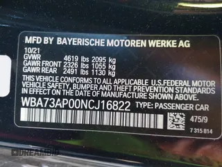 2022 BMW 4 Series 430i xDrive with VIN WBA73AP00NCJ16822, listed as a IAAI auction lot 41329235 with 30,570 mi miles and . Bid and sale history available at DreamBid. Image 9.