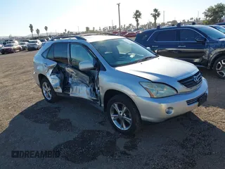 2006 Lexus RX 400h with VIN JTJHW31U560026104, listed as a IAAI auction lot 41311951 with 246,861 mi miles and . Bid and sale history available at DreamBid. Image 1.